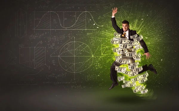 Cheerful businesman jumping with dollar banknotes around him — Stock Photo, Image