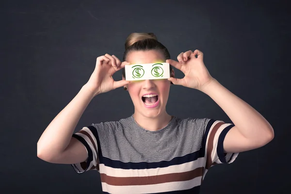 Joven sosteniendo papel con signo de dólar verde —  Fotos de Stock