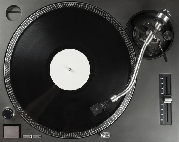 Turntable playing vinyl close up with needle on the record — Stock Photo, Image