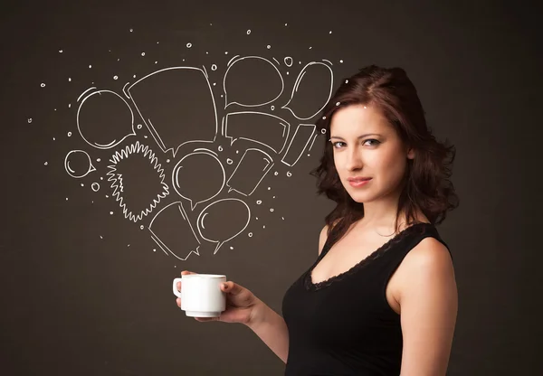Businesswoman holding a white cup with speech bubbles — Stock Photo, Image