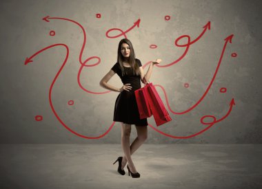 Şık kadın alışverişi ve kırmızı oklar