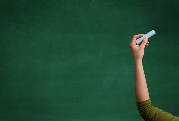 Hand writing on clean blackboard — Stock Photo, Image