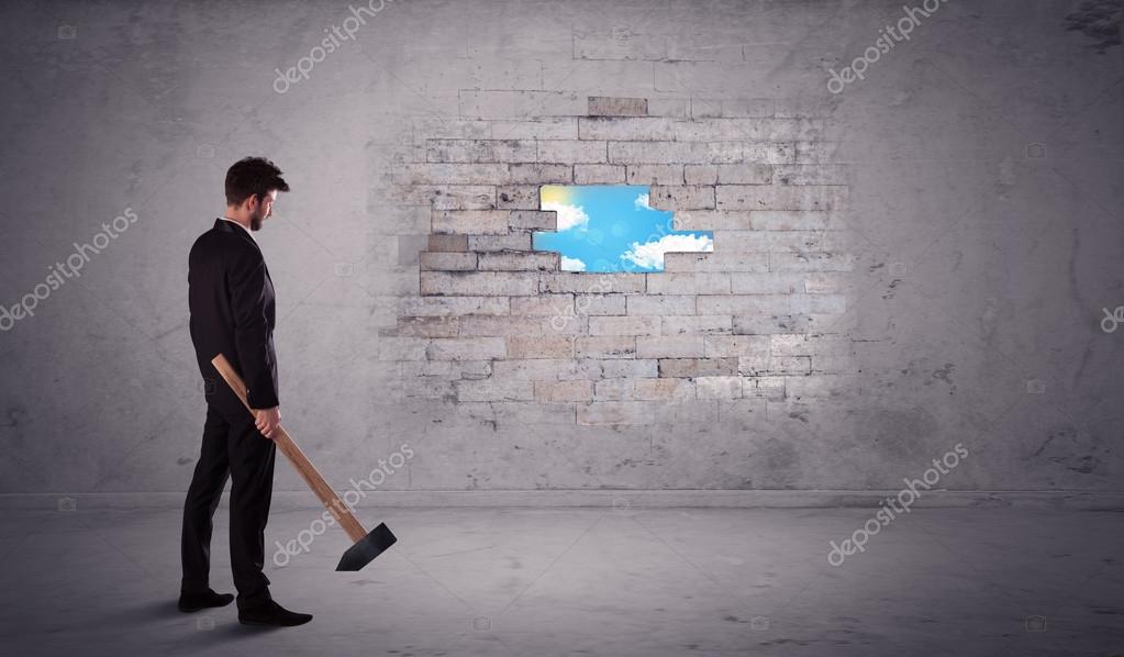 ломаем всë. демонтажные работы реклама. ломаем всë. человек у стены. ломаем всë.