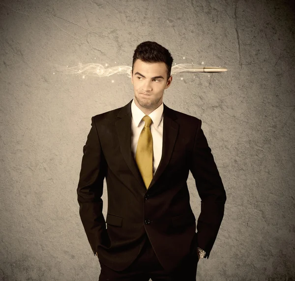 Fast creative sales guy with smoking bullet — Stock Photo, Image