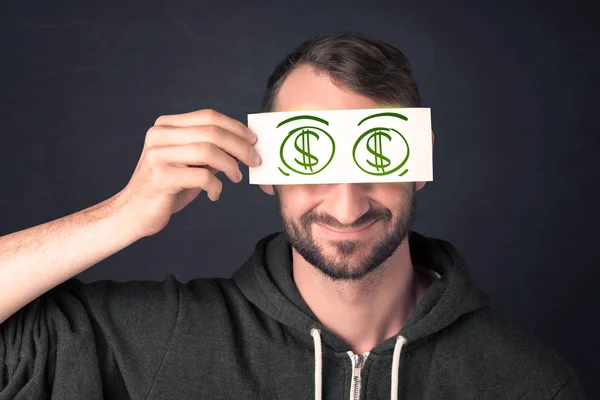 Guy holding a paper with hand drawn dollar sign — Stock Photo, Image