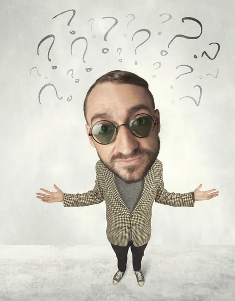 Big head person with question marks — Stock Photo, Image