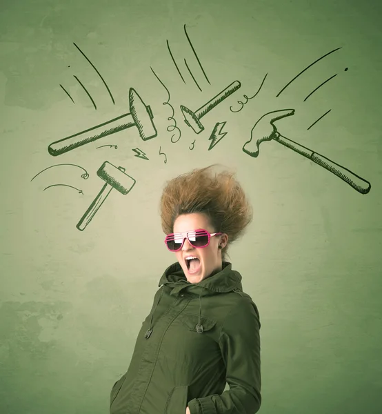 Tired woman with hair style and headache hammer symbols — Stock Photo, Image