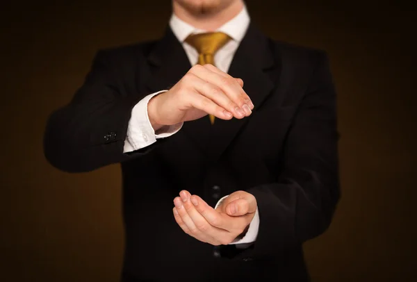 Businessman holding something — Stock Photo, Image