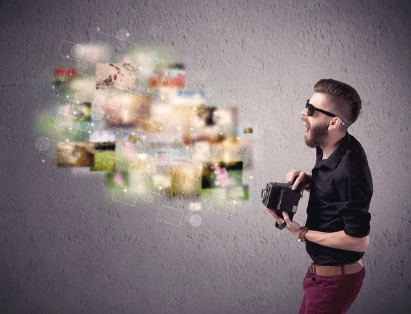 Young malewith beard taking vintage photos — Stock Photo, Image