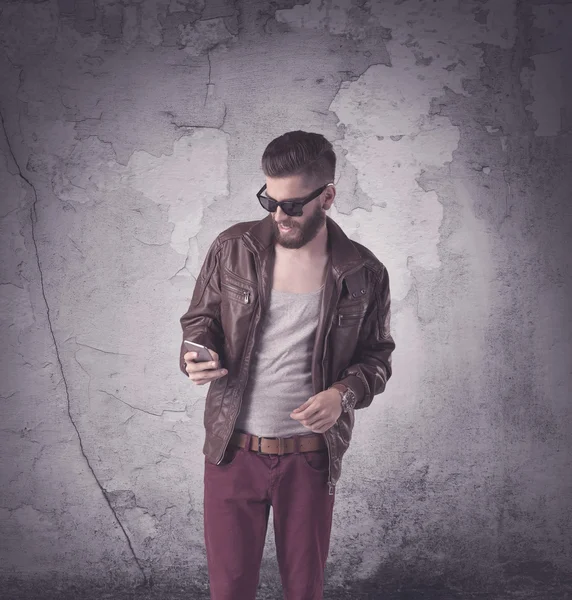 Handsome hipster in fashion clothing — Stock Photo, Image