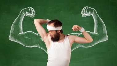 Sıska genç adam çalışıyor.