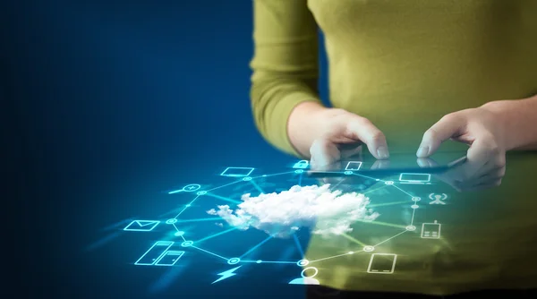 Close up of hand holding tablet with cloud network technology — Stock Photo, Image