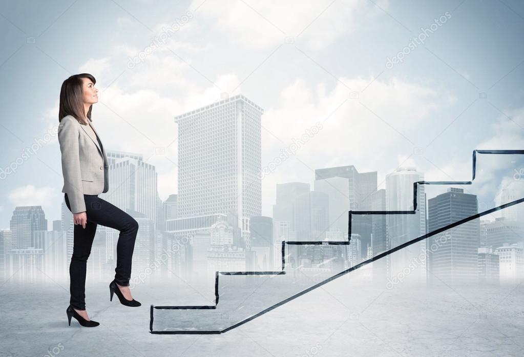 Business person in front of a staircase