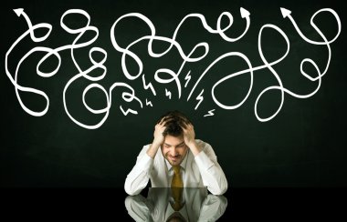 Depresyondaki işadamı çizgili çizgiler altında oturuyor