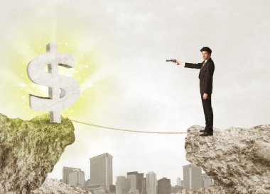 Bir dolar işareti ile rock dağda işadamı