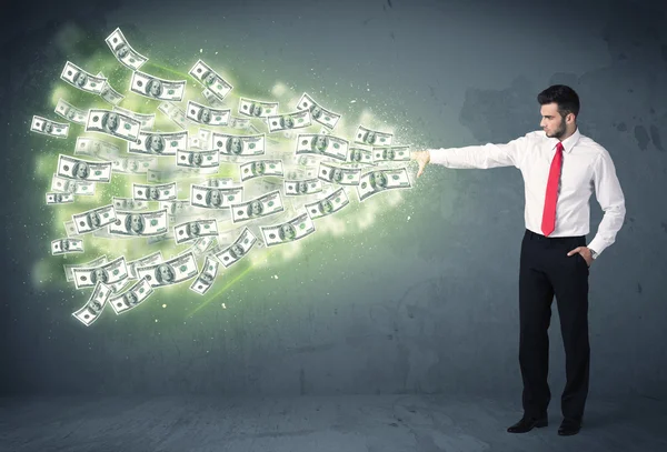 Empresário jogando um monte de conceito de notas de dólar — Fotografia de Stock