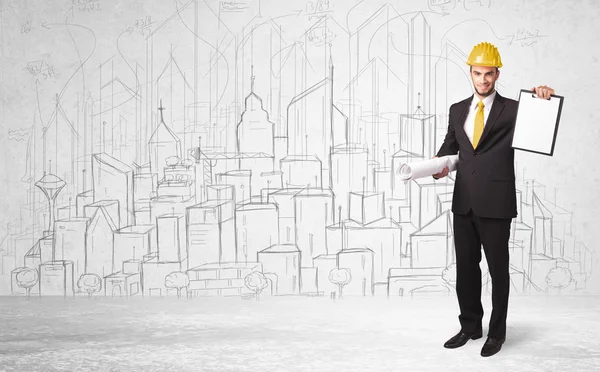 Construction worker with cityscape background — Stock Photo, Image