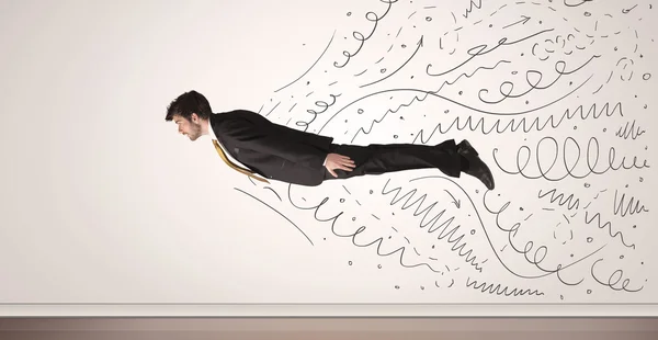 Business man flying with hand drawn lines comming out — Stock Photo, Image