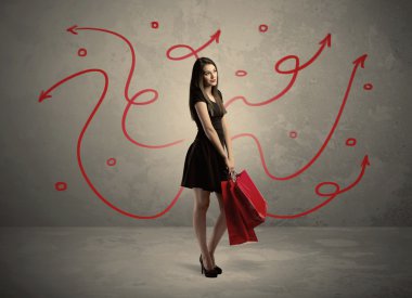 Şık kadın alışverişi ve kırmızı oklar