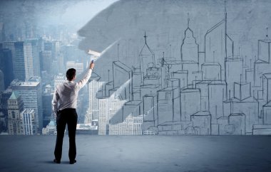 Zarif satıcı şehri duvarda yeniden boyuyor.