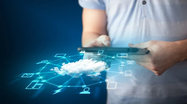 Close up of hand holding tablet with cloud network technology — Stock Photo, Image