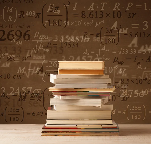 Books on vintage background with math formulas — Stock Photo, Image