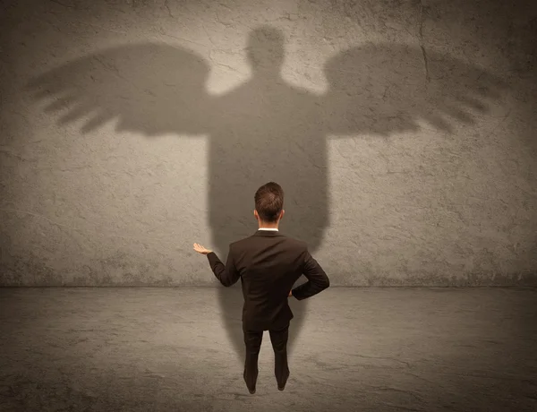 Vendedor honesto com conceito de sombra de anjo — Fotografia de Stock