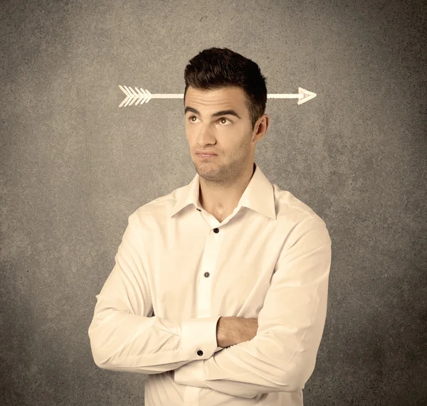 Young sales guy with arrow in the head — Stock Photo, Image