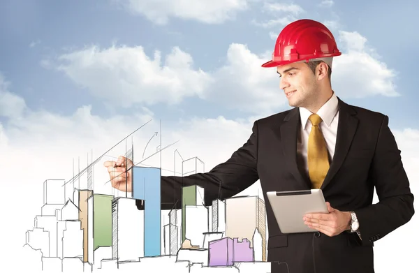 Construction worker planning a city sight — Stock Photo, Image