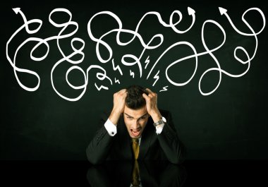 Depresyondaki işadamı çizgili çizgiler altında oturuyor