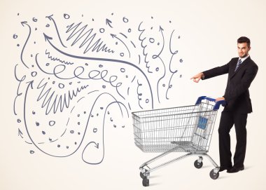 Bir alışveriş sepeti iterek işadamı