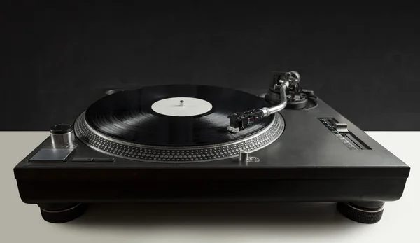 Turntable playing vinyl close up with needle on the record — Stock Photo, Image