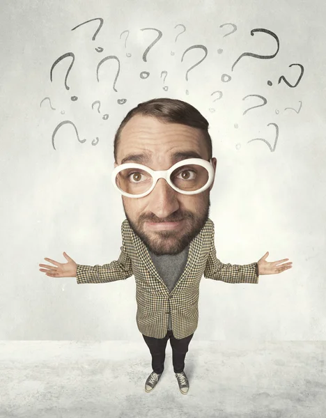 Big head person with question marks — Stock Photo, Image