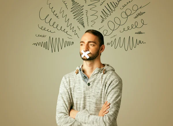 Young man with glued mouth and curly lines — Stock Photo, Image