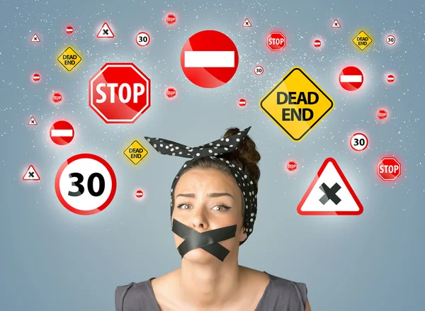 Young woman with glued mouth and traffic signals — Stock Photo, Image