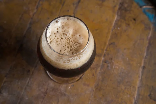 Dark beer in a cellar — Stock Photo, Image