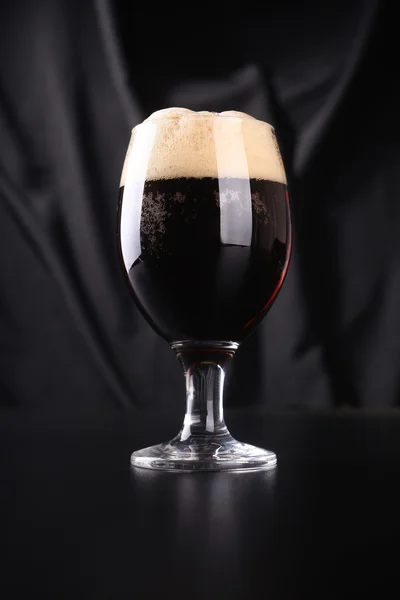 Glass of dark beer — Stock Photo, Image