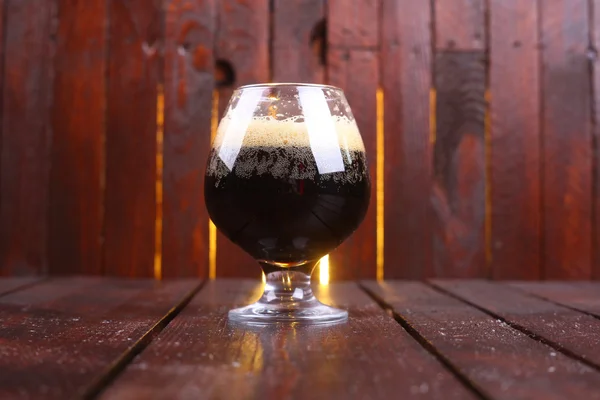 Glass of dark stout