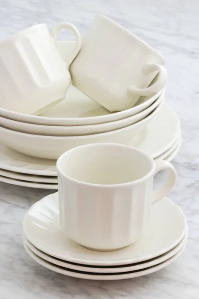 white porcelain dinnerware set with classic rimmed design perfect image for your next project.