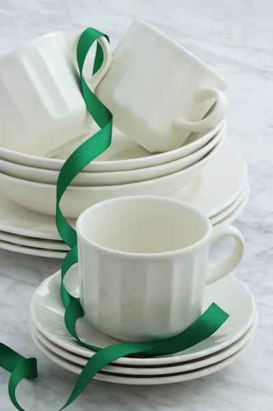 white porcelain dinnerware set with classic rimmed design perfect image for your next project.