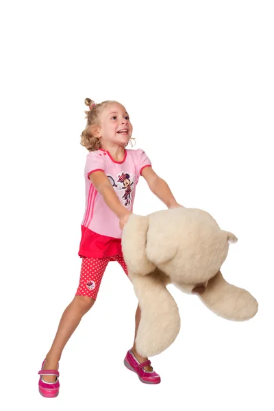 Klein meisje spelen met teddybeer — Stockfoto