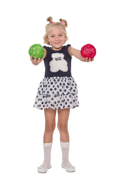 Meisje met gekleurde ballen — Stockfoto