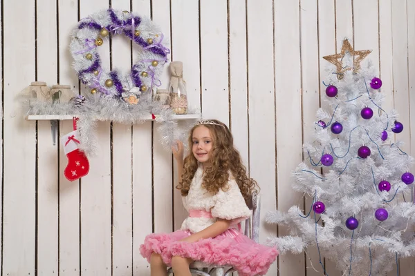 Little girl over fir tree — Stock Photo, Image