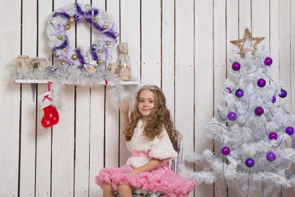 Little girl over fir tree — Stock Photo, Image