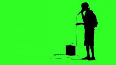 Bir mikrofon ile adam beatbox silüeti. Yeşil ekran arka planı. animasyon.