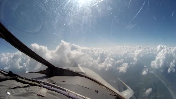 Flight over clouds view from cockpit plane. — Stock Video