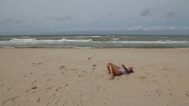 Girl with sand Baltic sea beach — Stock Video