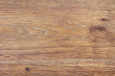 Wood texture background, light brown wooden surface with nature color. Top view of wooden table for backdrop and wallpaper. Abstract knotted wood or plywood pattern with grains. 