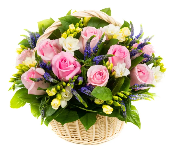Natural pink roses in a basket — Stock Photo, Image