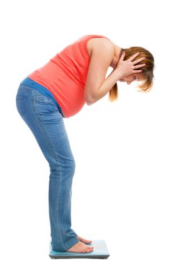 Ölçeklerde sürpriz hamile kadın